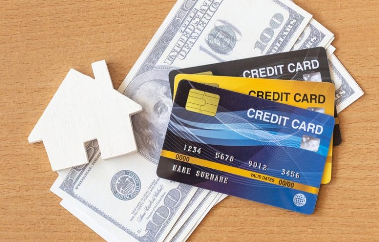 credit cards and cash to buy real estate